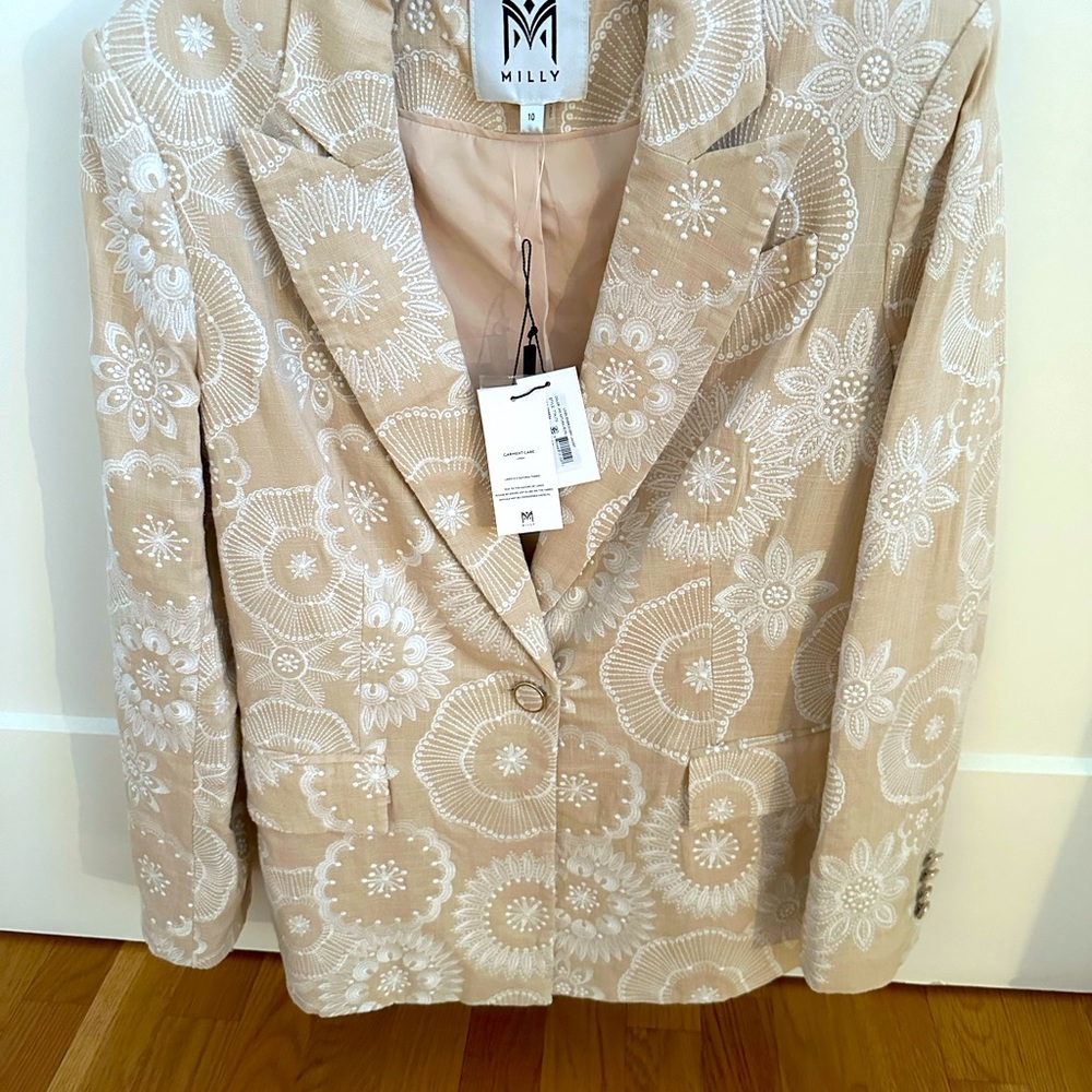 Beautiful soft pink /blush jacket . Bought at Saks fifth avenue.